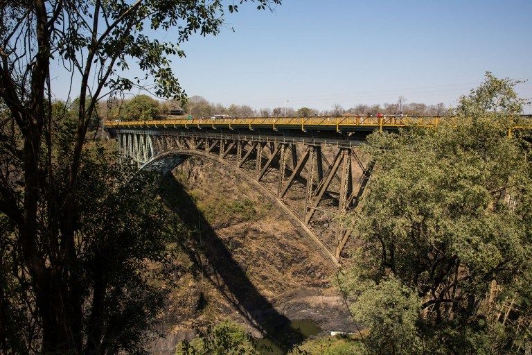 Crossing the Victoria Falls Bridge into Zambia – Earth Trekkers